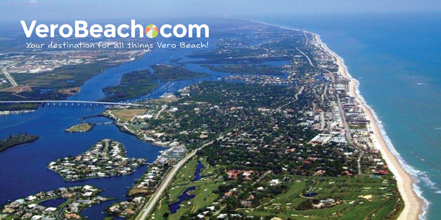 Aerial view of the barrier island in Vero Beach, Florida looking north with Atlantic Ocean on the right and Indian River Lagoon on the left of photo.